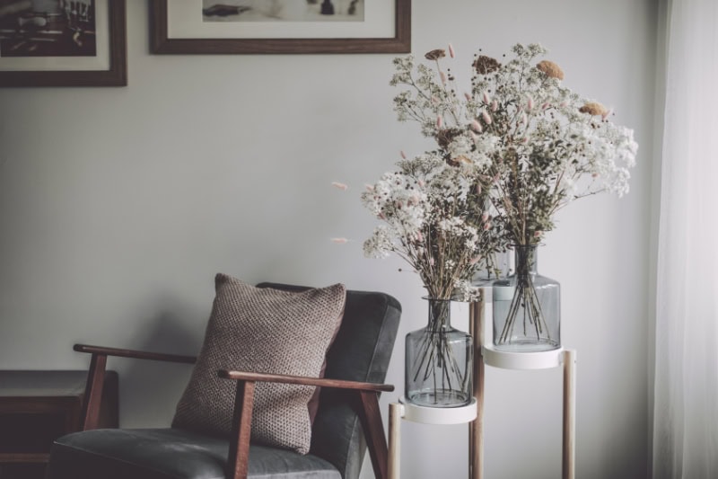 How an Air Handler Works. Flower arrangement on an end table in a living room.